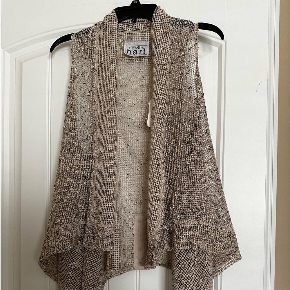 NWT Mesh vest with asymmetrical hem. One side